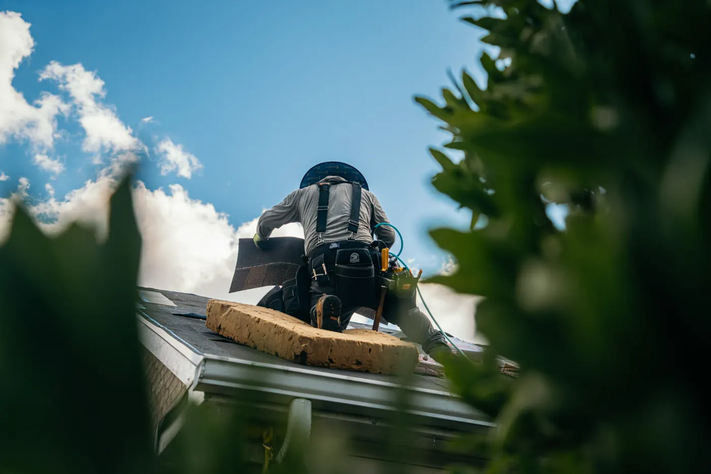 Emergency tarping on a Amo roof